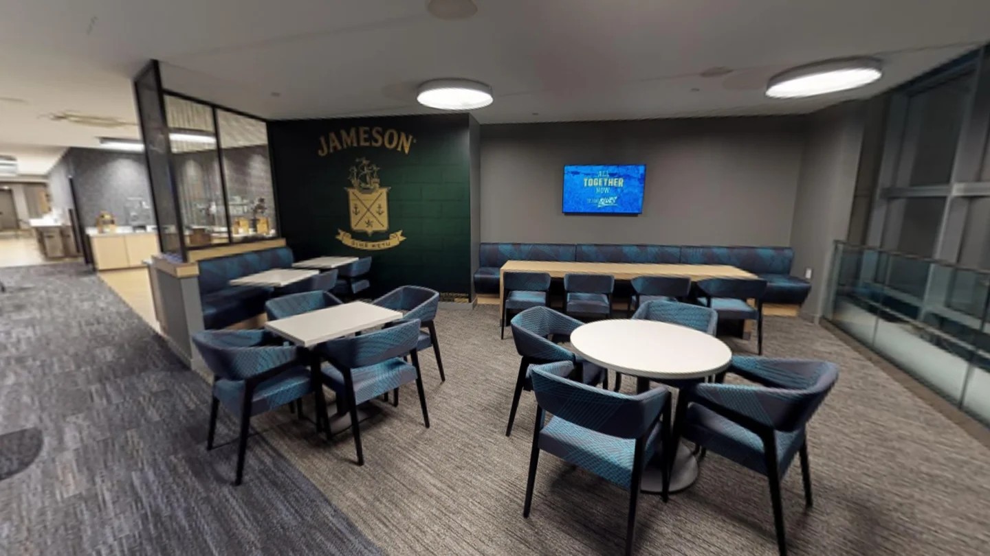 Jameson Club at Clark Avenue, the jameson crest wall in the lounge seating area. co-designed